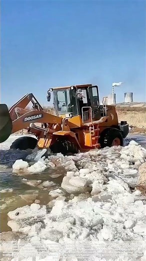 Stranded on Ice: The Delicate Escape of a Sunken Excavator