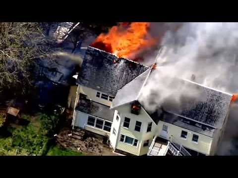 Large fire burning in Lowell, Mass. — live aerial footage
