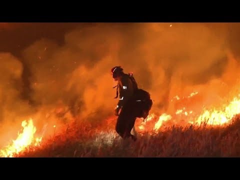 Crews rush to battle Springs Fire in Southern California