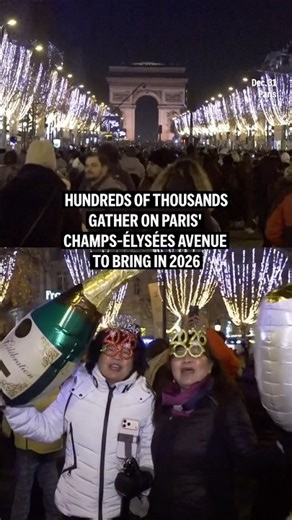 Hundreds of thousands gather on Paris'Champs-Élysées Avenue to bring in 2026