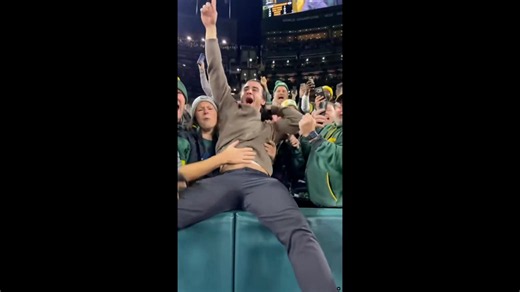 Sal Frelick celebrates with a 'Lambeau Leap'