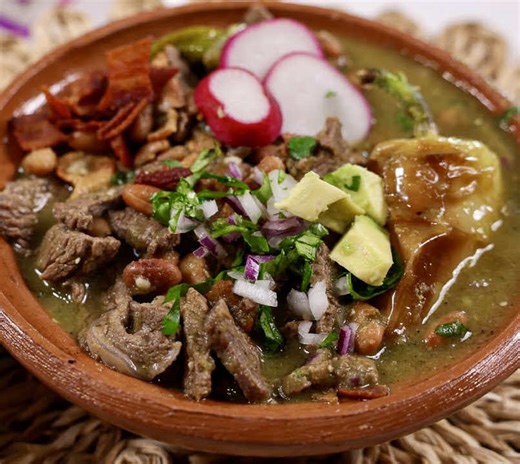 This CARNE EN SU JUGO holds a very special place in my heart. 🤍 it was passed down by one of my tías, this family recipe is the reason I chose to include it in my new cookbook. Ingredients 12 ounces uncooked bacon, chopped 6 bbq onions (Chambray) 6 fresh yellow jalapeño peppers 2½ pounds beef steak (flank, skirt, or sirloin), thinly sliced and cut into 1-inch pieces Salt, to taste Black pepper, to taste 3 cups cooked pinto beans\t For the green tomatillo sauce 15 tomatillos, peeled 8–10 jalapeñ
