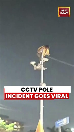 CCTV Pole Incident Goes Viral Man Seen Climbing Surveillance Structure in Unusual Video #viralvideo