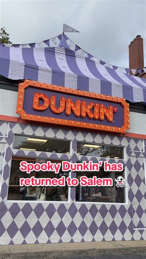Dunkin’s SPOOKIEST location is BACK for Halloween season! The iconic Salem, Massachusetts Dunkin’ has returned for 2026 with its second annual Halloween takeover, and this year’s theme is Spidey D’s Horror House. The one-of-a-kind location has been completely transformed into a creepy, carnival-inspired experience featuring exclusive Salem merchandise, a possessed Zoltar fortune-telling machine, spooky décor, Spider Donuts, and Halloween drinks like the Creepy Crawler Coffee Chiller and Terror-m