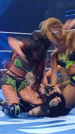 Fatal Influence take out Rhea Ripley!