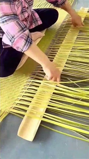 Traditional weaving process of bamboo mat