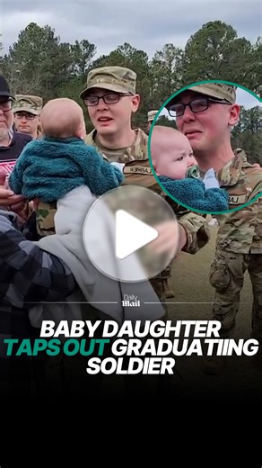 Soldier moved to tears as baby daughter greets him at graduation