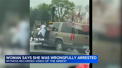 Suburban woman says armed off-duty cop pulled her from vehicle