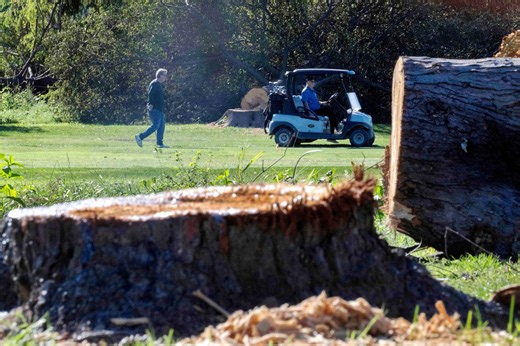 Amid attacks by Trump, judge weighs golf course plan in tense hearing