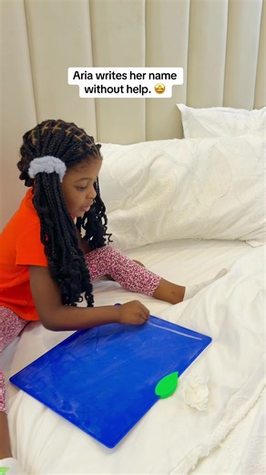 Aria Independently Writes Her Name with Joy