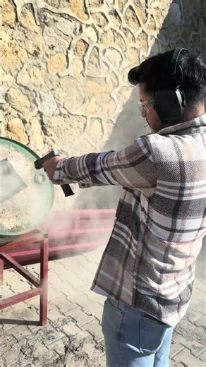 Shooting a Sand-Filled Barrel with a 9mm Glock