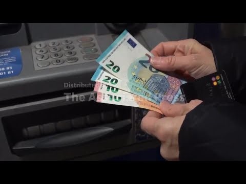 Cash machines in Bulgaria issue euros for the first time on day of joining the currency union