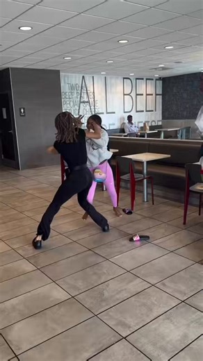 WATCH: 2v2 brawl in a McDonalds.