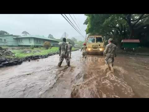Hawaii Army National Guard helps residents on flooded highway as Hurricane Nolo skirts islands
