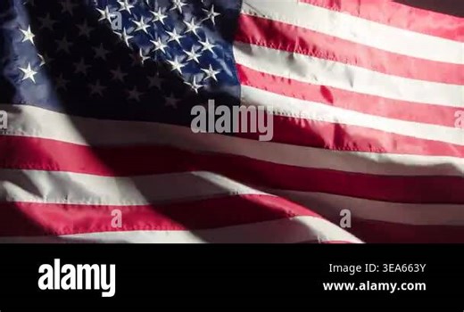 Video of a real American flag close-up. Fresh unfolded flag of the United States of America waving slowly in bright light Stock Video Footage - Alamy