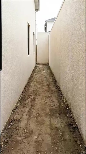 Hillside Collapse Spurs Massive Retaining Wall Build