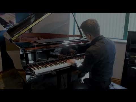 Yamaha C1X grand piano in polished ebony