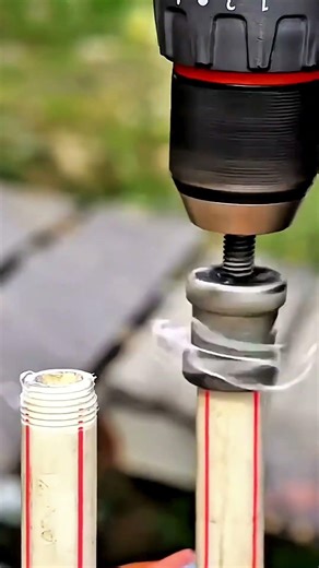 Drill spinning fast creating precise threads on metal pipe #shorts