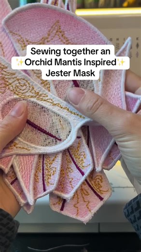 Thank you so much for ordering this Orchid Mantis themed Harlequin mask! ✨ (watch to the end to see 3 other custom Harlequin masks) . 🎭 More about this mask: My Harlequin masks are all customizable, and they are glasses-friendly! Meaning you can comfortably wear them over top of your glasses. They also have 10 bendable parts with jingle bells that you can pose in different ways. :) My masks are all designed by me and made using freestanding embroidery. My masks are all pure polyester. . Sewing 