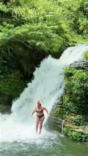 A Decisive Jump Like a Professional Athlete #waterfall #jump #girl