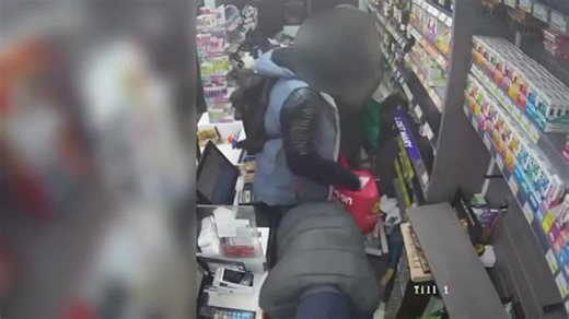 Moment thieves fill pockets with vapes, alcohol and cash in shocking raid