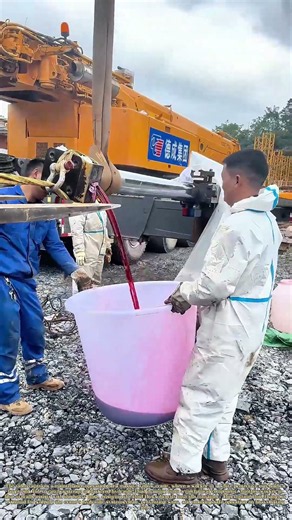 Draining the Gears: How Mechanics Flush Hydraulic Fluid from a Crane
