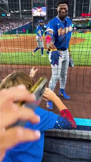 Ronald Acuña Jr. gifts a young fan his batting glove 😍🤗