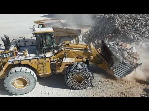 Caterpillar 992K Wheel Loader Loading Blasted Materials Onto Caterpillar 777F Dumpers - Interkat SA