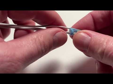 Installing shield termination sleeve and wire