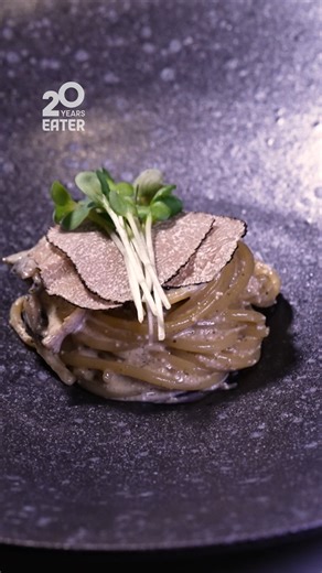 Chef Niki Nakayama prepares abalone pasta for the shizakana course, which is Japanese for “chef's choice, not bound by tradition.” | Eater
