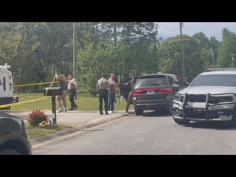 2 arrested after man spotted with rifle; deputies say guns, drugs and alcohol found in home