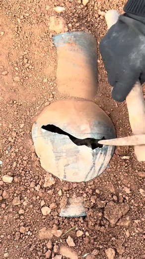 extracting ancient jar 🏺 filled golden #archaeology #history