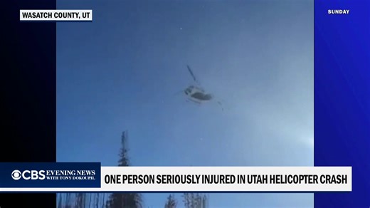 The FAA is investigating a helicopter crash in northern Utah after video showed it spiraling out of control and crashing into a grove of pine trees Sunday. Four people were on board, and one was injured. | CBS Evening News