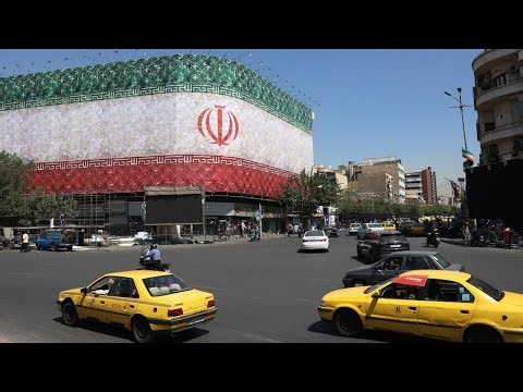 World awaits U.S.-Iran nuclear negotiations as some Strait of Hormuz traffic resumes