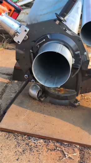 Heavy-Duty Industrial Tool Working Inside a Massive Metal Pipe