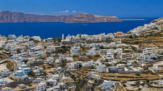 Santorini white village overlooking the deep blue Aegean
