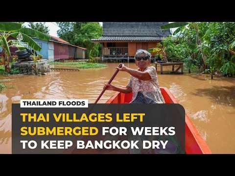 Thailand floods leave villages submerged to keep Bangkok dry