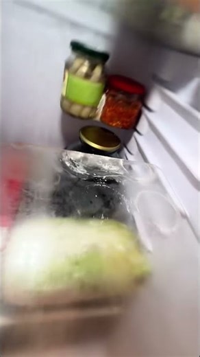 Glass Jars Hilariously Hang Without Fridge Shelf || ViralHog