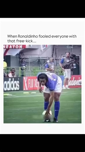 Theee Whole World on Instagram: "Ronaldinho’s iconic free-kick against England in the 2002 World Cup quarter-final is widely regarded as one of the most magical moments in football history. Taking a free-kick from approximately 35 yards out on the right touchline, Ronaldinho curled the ball over the head of England goalkeeper David Seaman, who had stepped forward, leaving the net exposed. The goal, which came just after halftime, proved decisive in Brazil’s 2-1 victory and propelled them to thei