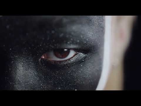Close Up Video of Man with Black Face Paint