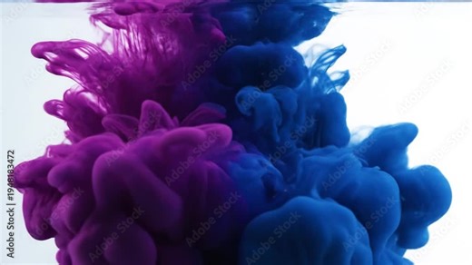 Color Explosion: A captivating dance of vibrant hues, where a cascade of indigo and purple ink intertwines, creating an abstract spectacle of color and form, igniting the imagination.