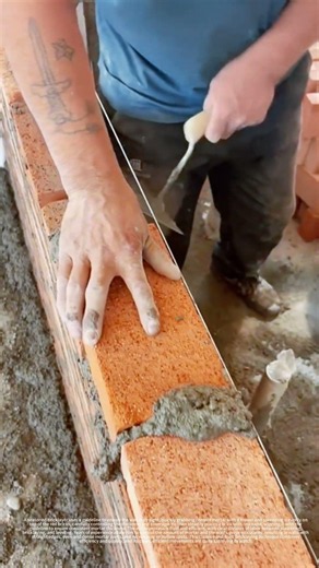 Smooth bricklaying work, spreading mortar and placing bricks with precise alignment