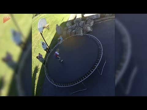 Boy Crashes Into Trampoline Springs During Flip - 1869252