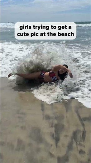 girls trying to get a cute pic at the beach