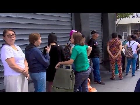 Venezuela residents flood shops in fear of scarcity