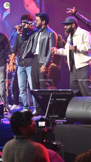 Dulquer Salmaan singing and dancing at the stage