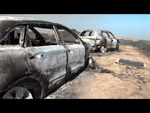 Wreckage shows charred cars used by victims of Spain's deadly wildfire