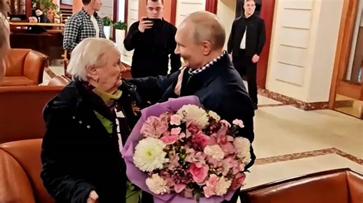 Watch: Putin’s flower-filled reunion with former teacher ignites social media debate- Moneycontrol.com