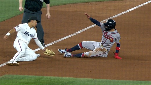 Liam Hicks throws out Mauricio Dubón at third base