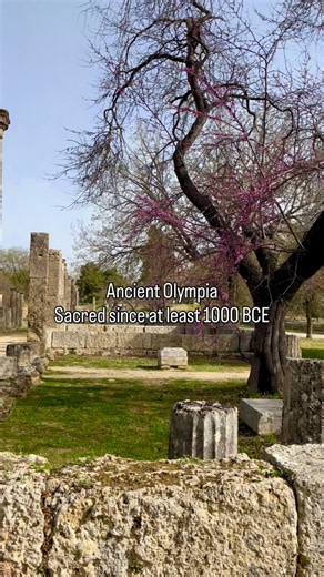This is Ancient on Instagram: "At Olympia, the valley is quiet today, but its sounds carry deep history. By c. 1000 BCE, Olympia was already a sacred sanctuary dedicated to Zeus. When the Olympic Games were first recorded in 776 BCE, this place came alive every four years. In Olympia’s prime, the air would have been filled with human voices, footsteps on packed earth, the calls of vendors, the prayers of priests, and the roar of crowds as athletes competed. Sacrificial fires burned, bronze statu
